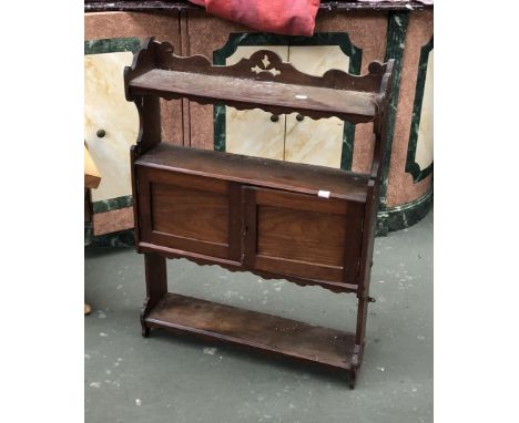 A mahogany spice rack, 58cmW 