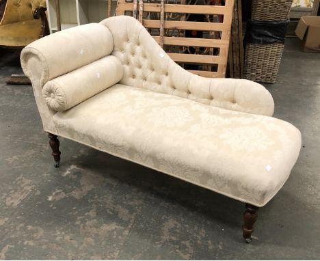 A very small button back chaise longue, on turned legs, 122cmL 