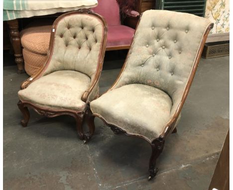 Two 19th century button back bedroom chairs, each with carved mahogany frames on carved cabriole legs, one with brass casters