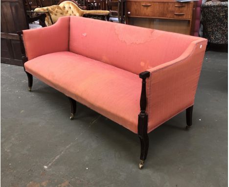 A 19th century square back sofa with reeded mahogany arm supports on swept front legs with brass caps and casters, 191cmW 