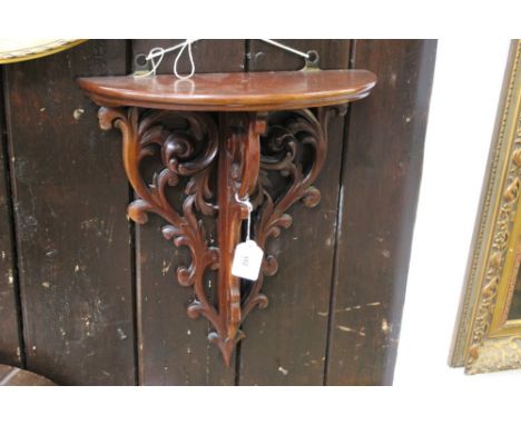 Mahogany wall bracket with pierced leaf bracket supports