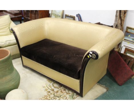 A gold crocodile skin effect two seater settee, with brown velvet cushion seat.  Height 80 cm, width 190 cm.