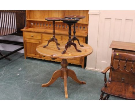 Circular pine dining table and three tripod tables (varying designs)