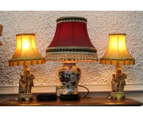 Pair of figural table lamps and shades and a table lamp and shade in form of ginger jar  with dragon pattern