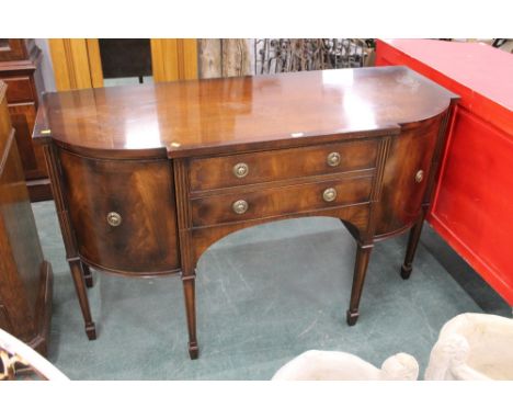 G T Rackstraw Worcester, a breakfront mahogany sideboard with two central drawers and cupboards, height 92 cm, width 153 cm, 