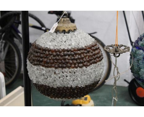 Clear and amber glass ceiling light fitting. +/- 33 cm. 