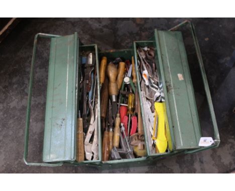 Green foldout toolbox and tools, wood chisels, pliers, spanners, scribe etc.