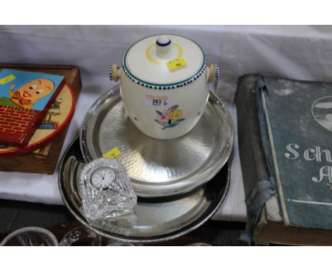 Waterford mantel clock, Poole biscuit barrel and four Borrowdale hand beaten trays