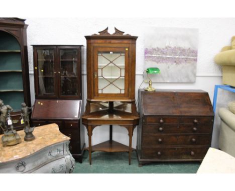 Late Victorian freestanding corner cupboard with astragal glazed door and mirrored shelf below, 203 cm tall