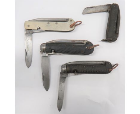 Four Military Jack Knivesconsisting white metal sided example marked "Encore T Turner & Co" with "WD" broad arrow.  Large bla