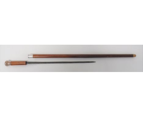 Late Victorian Sword Stick18 inch, double edged, narrow blade.  Polished malacca cane handle with silvered ball top.  Contain
