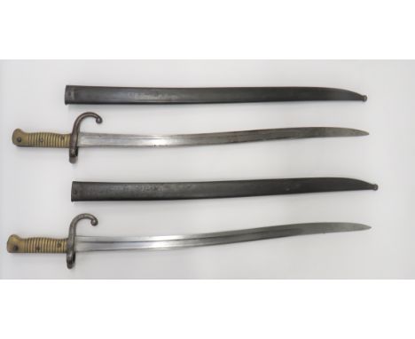 Two French M1866 Chassepot Bayonets22 1/2 inch, single edged, yataghan blades with fuller.  Rear spine with maker details for