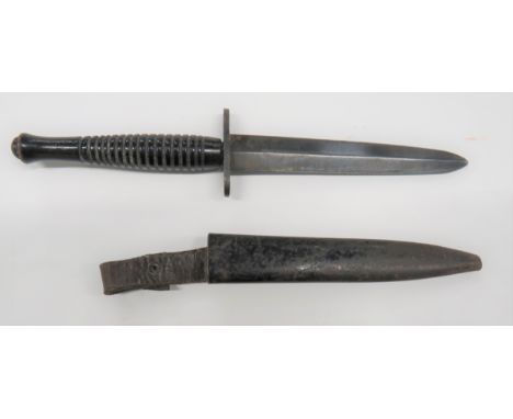 WW2 F-S Wooden Handle RAF/Commando Knife5 1/2 inch, double edged, shortened blade.  Blued steel, oval crossguard ... Ribbed w