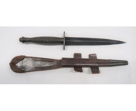 WW2 3rd Pattern Fairburn-Sykes Commando Fighting Knife7 inch, blued, double edged blade. Blued steel oval crossguard.  Blacke