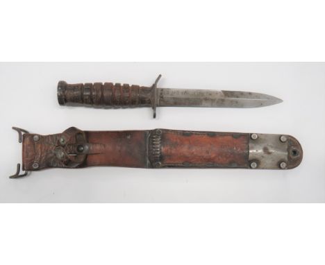 Scarce American M3 Combat Trench Knife In M6 Scabbard6 3/4 inch, single edged blade with back edge sharpened point.  Flat wit