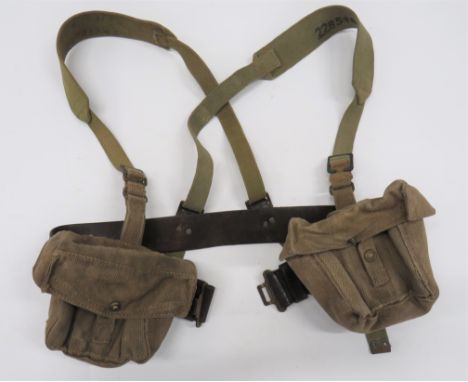 Pair of Home Guard Ammunition Poucheskhaki webbing, square form pouches.  Top flap secured by a tab and brass press stud.  Re