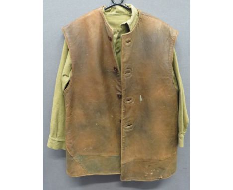 1941 Dated Leather Jerkinbrown leather, multi panel, single breasted, sleeveless jerkin.  The front secured by four composite