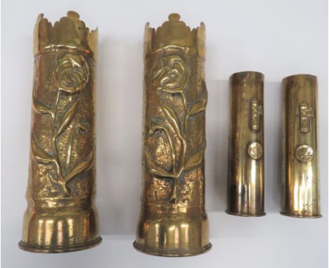 Four Trench Art Decorated Shell Casesconsisting pair of 18pr shell cases dated 1917 and 1918.  Both with matching scallop top