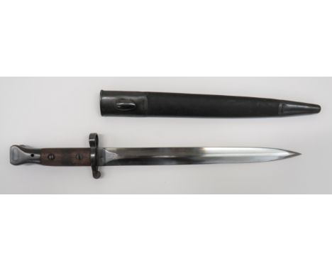 1903 Pattern Commercial Bayonet By Enfield12 inch, double edged blade.  Forte with "EFD" (Enfield).  Blued steel crossguard, 