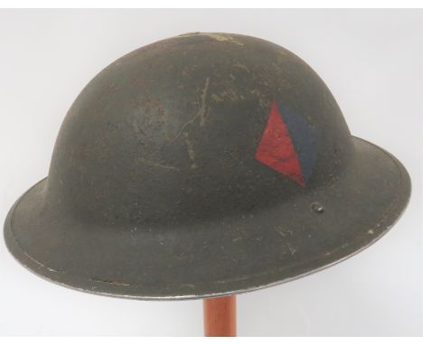 1940 Dated Royal Artillery Flashed MKII Steel Helmetdark green painted, oval shell.  The side with painted red and blue diamo