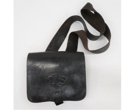 Mid 19th Century American Cartridge Pouch And Strapblack leather, large pouch.  The full front flap stamped "US".  Internal s
