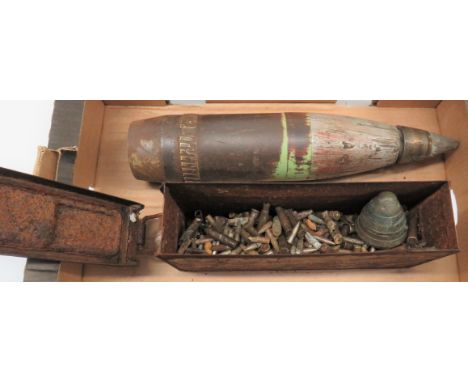Selection of  Excavated Inert Ammunitionincluding 105 mm, Howitzer steel head complete with fuse.  Some damage ... 1916 dated