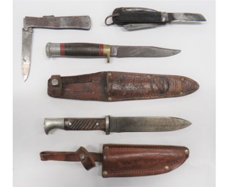 Four Various Knives consisting "Baron Germany" Hitler Youth style knife. &nbsp;Nickel plated guard and pommel. &nbsp;Wooden s