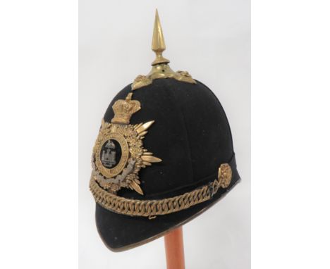 Victorian Essex Regiment Officer's Home Service Helmetblack felt, four panel crown.  Pointed front peak with brass edging.  R