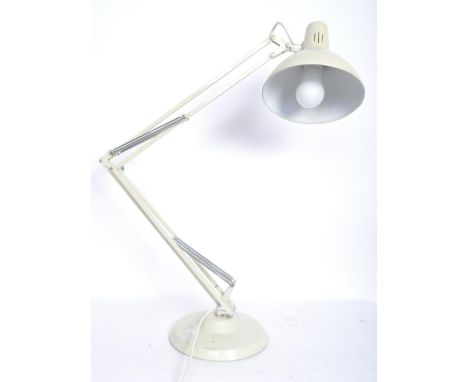 A retro 20th century 1001 Lamps anglepoise Industrial style desk lamp. Terraced base with twin adjustable arm and pendant sha