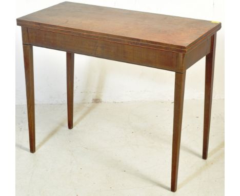An 18th century George III solid mahogany and box wood inlaid tea table.&nbsp; The table being raised on squared tapering leg