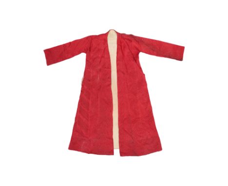 AN OTTOMAN QUILTED AND CORDED KAFTAN OF CRIMSON SATIN SILK Ottoman Provinces, early 20th centuryWith an A-line, flared profil