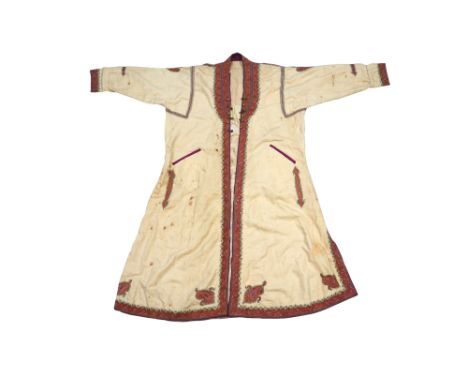 AN INDIAN EMBROIDERED CREAM-COLOURED PASHMINA WOOL ROBE Kashmir, North India, early 20th centuryWith a flowing and flared A-l