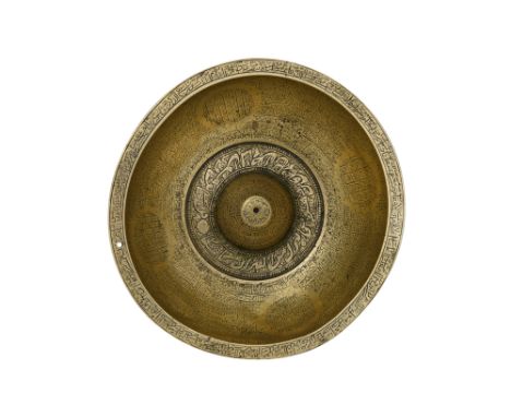 A QAJAR-STYLE ENGRAVED BRASS ‘MAGIC’ BOWL WITH ZODIAC SIGNS Possibly Iraq or Syria, 18th - 19th centuryOf shallow rounded sha