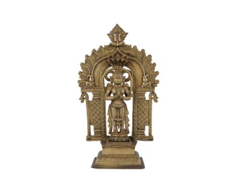 AN ENGRAVED BRASS HINDU ALTARPIECE OF THE MONKEY GOD, HANUMAN Possibly South India, 18th - 19th centuryMade of three differen
