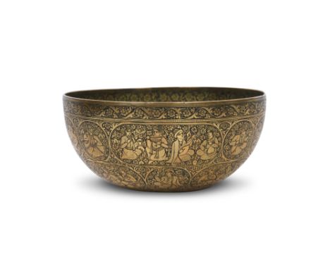 AN ENGRAVED JA'FAR-STYLE BRASS DRINKING BOWL Isfahan, Iran, late 19th centuryOf hemispherical shape with a flattened and subt