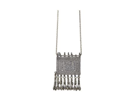 AN OMANI SILVER NECKLACE WITH AMULET CASE (HIRZ) Oman, Arabian Peninsula, 20th centuryThe rectangular silver hirz amulet case