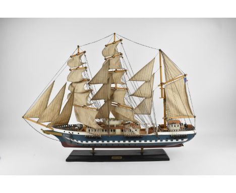 A 20th century painted wooden model of the sailing vessel, The Belem, with full rigging displayed, mounted on a black wooden 