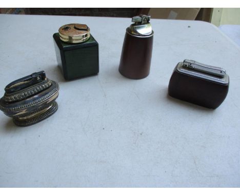 Four vintage table lighters to include Colibri and a small quantity of coins Location: 4.2 