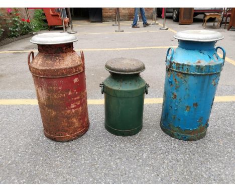Three vintage milk churns, tallest 72cm highLocation: 