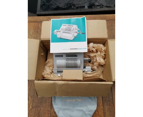A vintage original Odhner mechanical calculator/adding machine model 1048-1049 in original boxLocation: 
