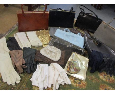 Mid 20th century handbags to include Mappin &amp; Webb and Acker, together with clutch bags and vintage ladies gloves, and an