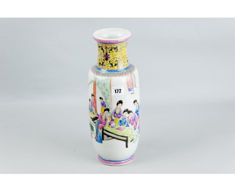 An early 20th Century slender vase with waisted yellow ground enamel decorated neck, the front painted scene depicting a grou