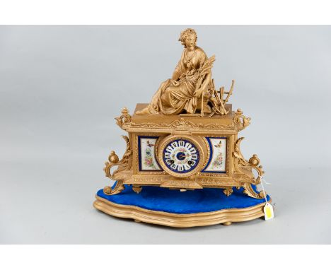 A French gilt metal and porcelain panelled mantel clock with associated stand, a Sevres style porcelain dial with Roman numer