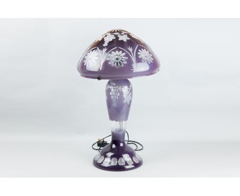 A large amethyst overlay cut glass table lamp (modern), 26 ins (66 cms) overall height, shade diameter 15 ins (38 cms)