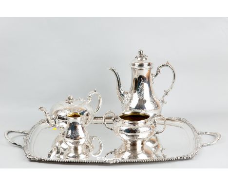 An electroplated four piece bright cut tea and coffee service with a matching heavy oblong twin handled tray having a feather