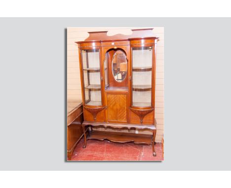 A late 19th/early 20th Century inlaid mahogany china display cabinet, twin convex glass doors with central oval bevelled edge