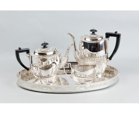 An electroplated four piece tea and coffee service on an oval galleried tray