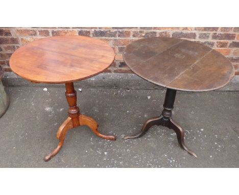 A George III oak tripod table 68cm diameter and one other Condition reports are not available for our Interiors sales.