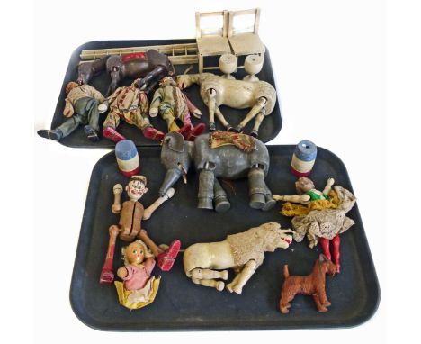 An assortment of vintage children's toys to include wooden toys, dolls etc. Condition reports are not available for our Inter
