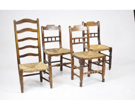 Three Victorian beech wood and rush seat kitchen chairsEach with a tri-spindle back above an envelope rush seat, ring turned 